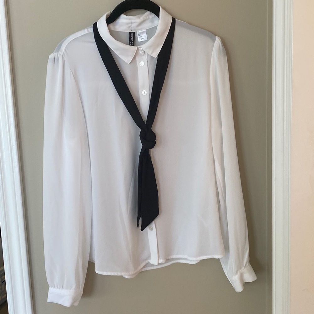 White button down with black tie detail